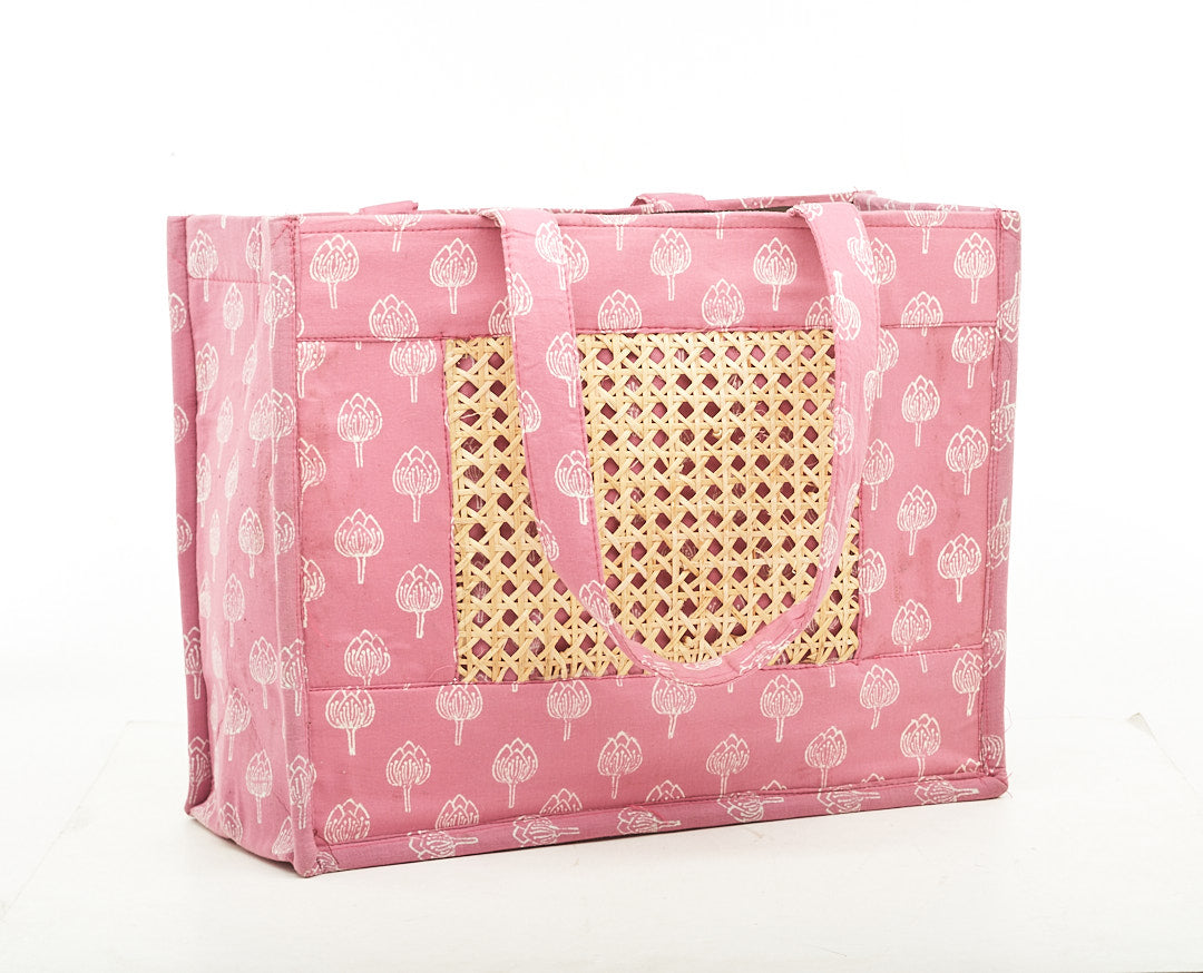 Punch Pink Colored Fabric Bag, with Flower Printing and Intricate Cane Work.
