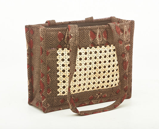 Peanut Brown Colored Fabric Bag, with Intricate Cane Work.